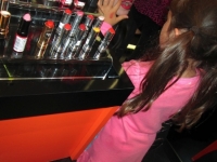 Miss Kendall touches up the lipline ...