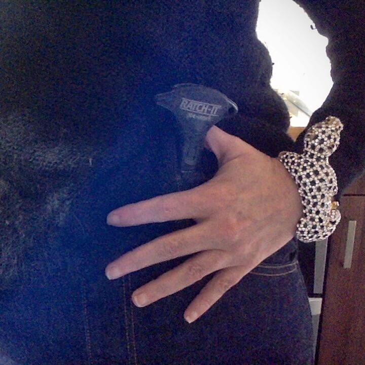 Leopard bracelet and Ratch-it tucked in waist illustrating #felinefine
