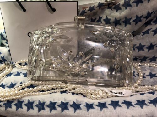 Vintage bag carved from lucite from seller Mouseyblue-2008 at eBay